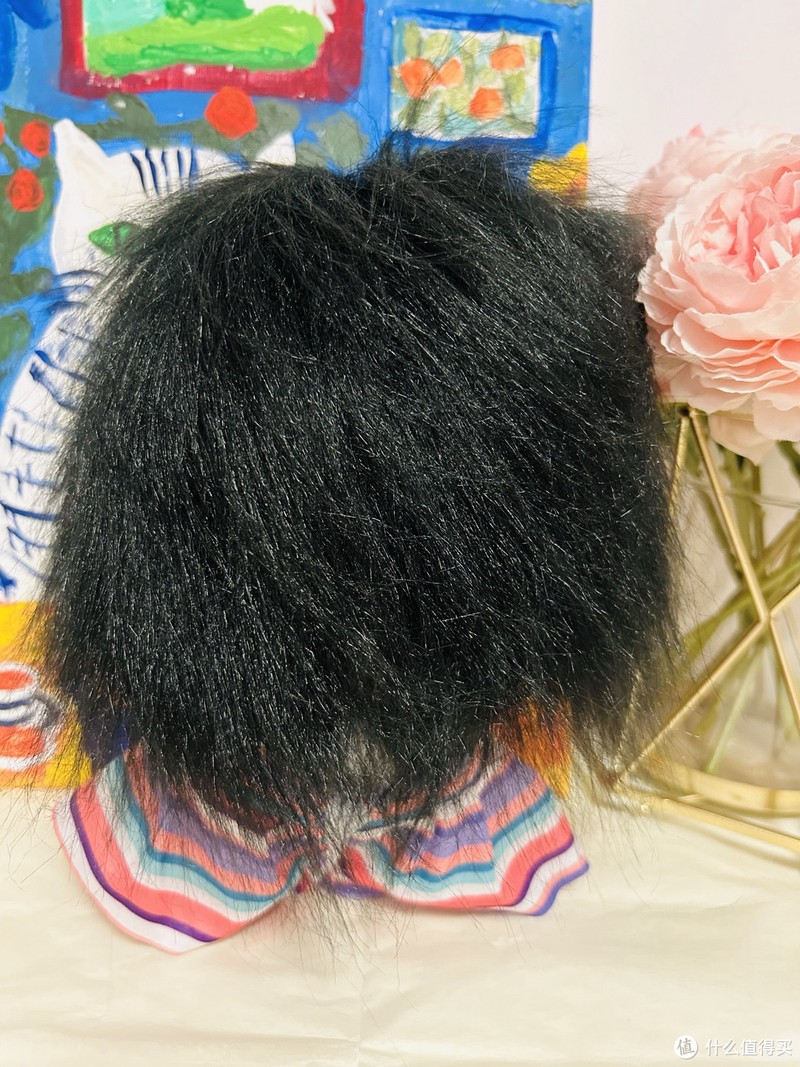 看看娃娃的后面,毛发特别浓密